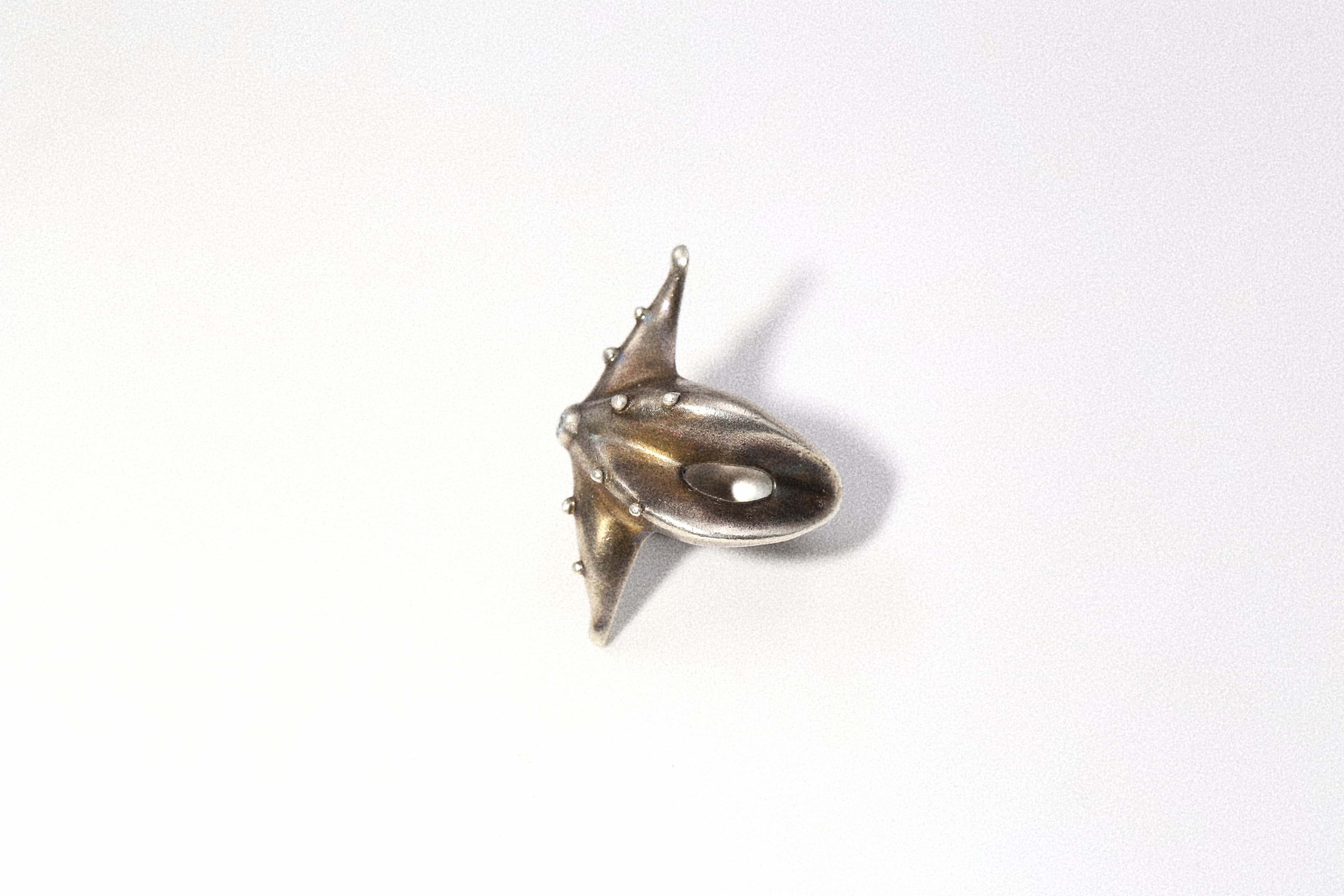 kinetic star ring T